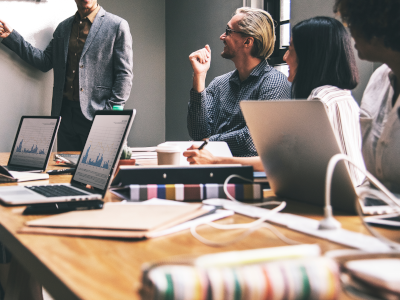 Business people around a desk